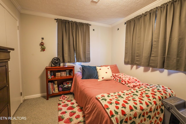 carpeted bedroom with crown molding and a textured ceiling