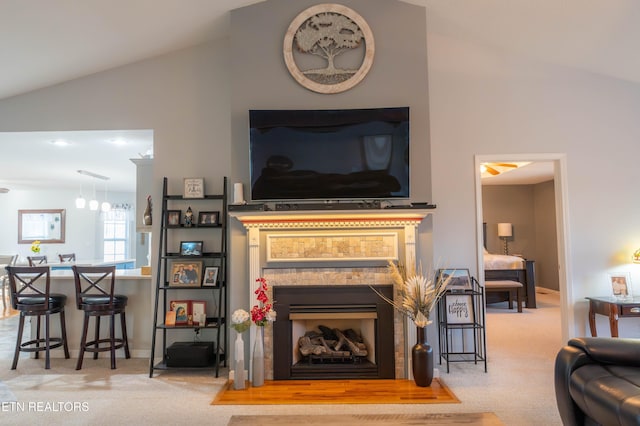 living room with carpet and lofted ceiling