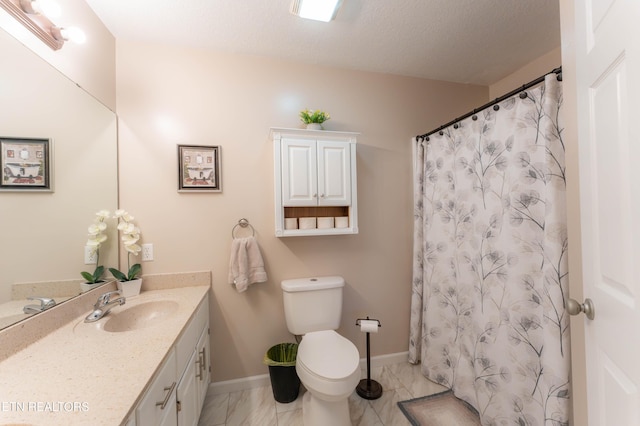 bathroom featuring a textured ceiling, vanity, toilet, and curtained shower