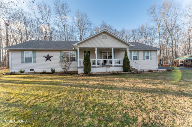 ranch-style home featuring a porch and a front lawn