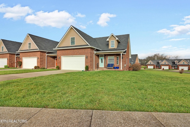 view of front of house with a garage and a front yard