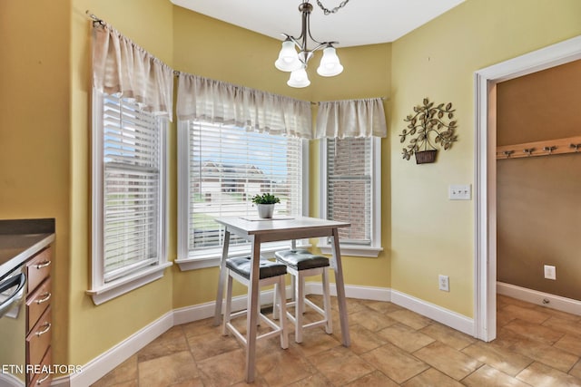 dining room featuring a notable chandelier