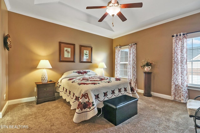 carpeted bedroom with multiple windows, ceiling fan, and crown molding