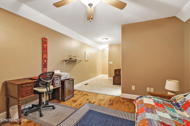 office space with light hardwood / wood-style flooring, ceiling fan, and lofted ceiling