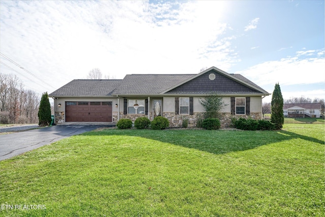 single story home with a garage and a front yard