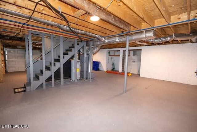 basement featuring gas water heater