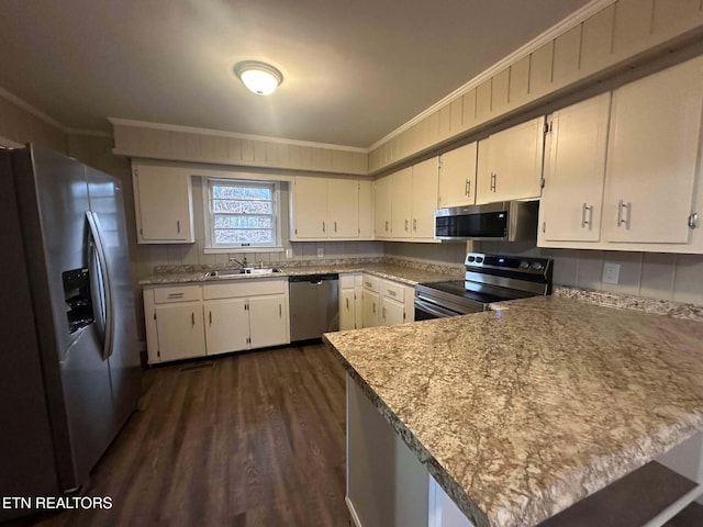 kitchen with kitchen peninsula, light stone countertops, dark hardwood / wood-style flooring, stainless steel appliances, and crown molding