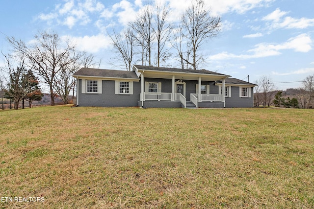 423 S Main St, Byrdstown, TN 38549 - view of front facade with covered porch and a front yard