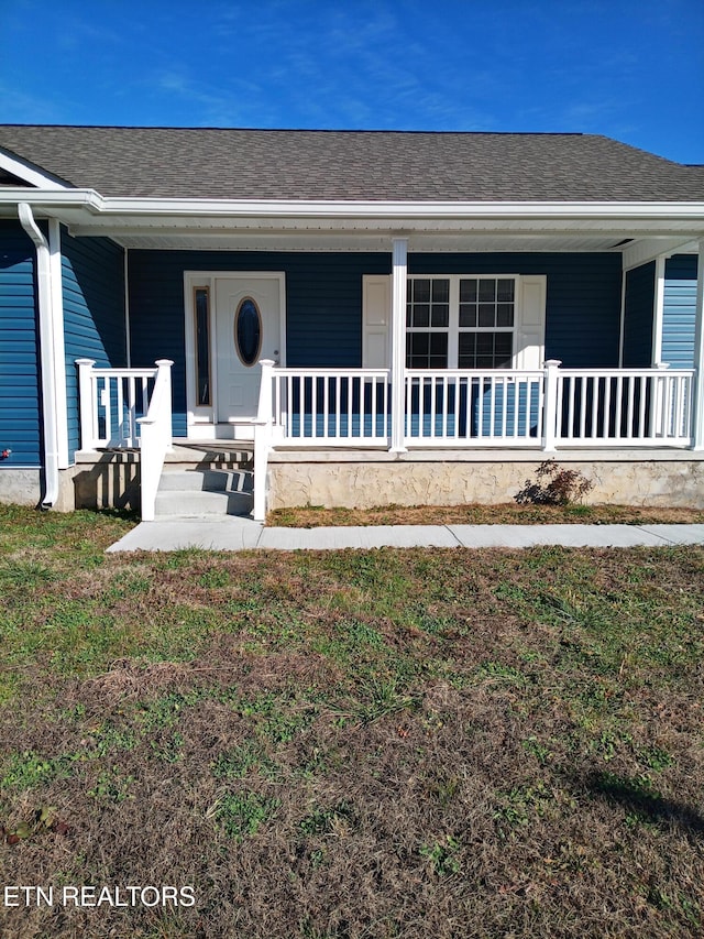 property entrance featuring a porch