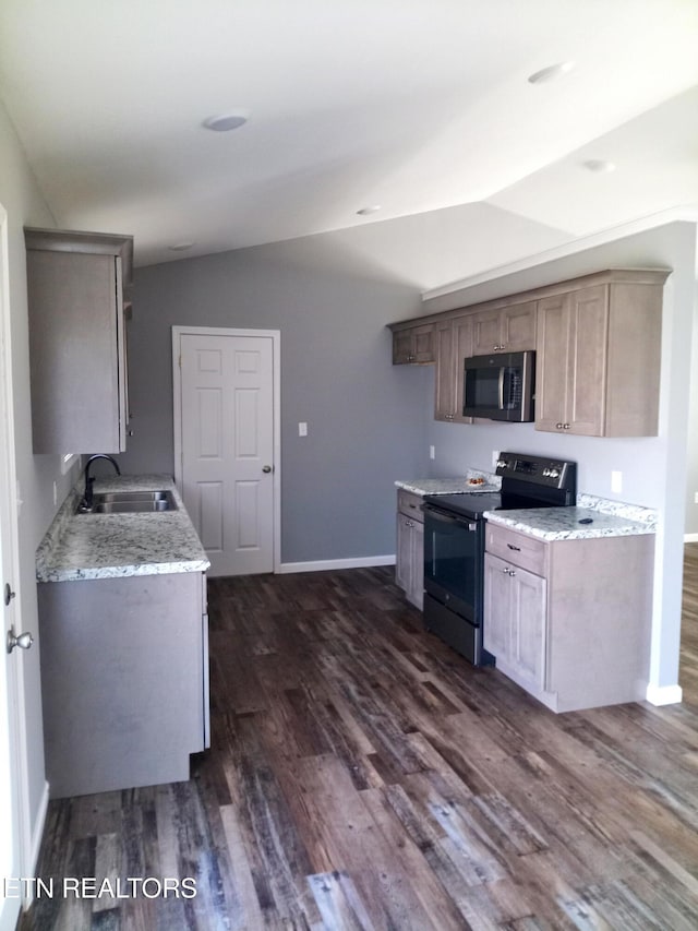 kitchen with dark hardwood / wood-style flooring, black / electric stove, lofted ceiling, and sink