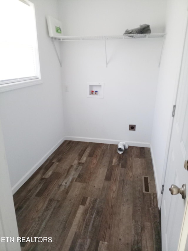 laundry room with hookup for an electric dryer, dark hardwood / wood-style floors, and hookup for a washing machine