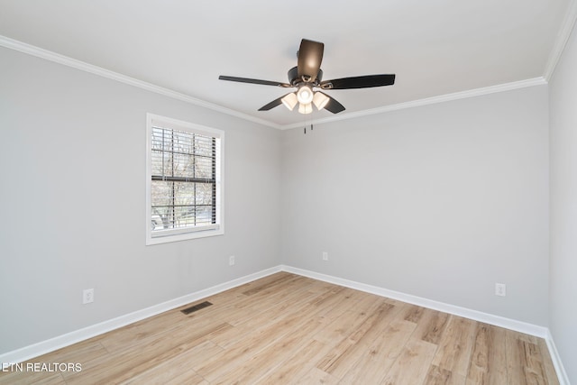 spare room with ceiling fan, light hardwood / wood-style flooring, and ornamental molding