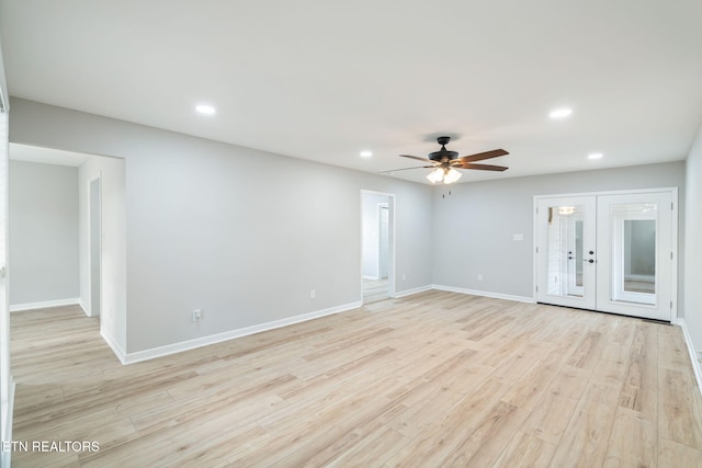 unfurnished living room featuring ceiling fan, light hardwood / wood-style flooring, and french doors