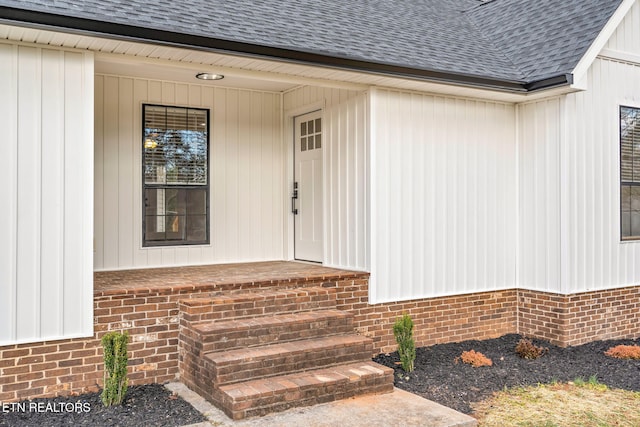 property entrance with covered porch