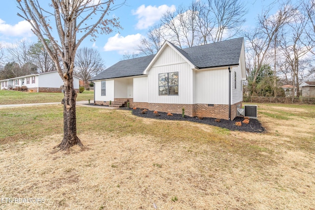 view of property exterior featuring a yard and cooling unit