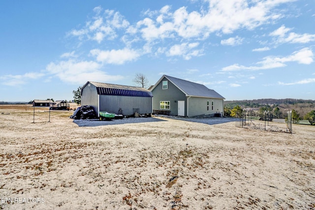 exterior space featuring an outdoor structure