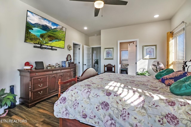 bedroom featuring ceiling fan and dark wood-type flooring