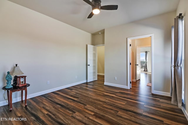 bedroom with ceiling fan and dark hardwood / wood-style flooring