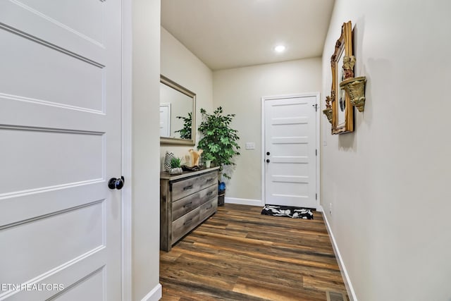 doorway to outside with dark hardwood / wood-style flooring