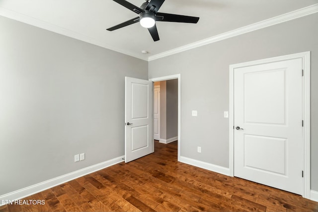 330 Kendall Hunt St, Knoxville, TN 37934 - unfurnished bedroom featuring ceiling fan, dark hardwood / wood-style flooring, and crown molding
