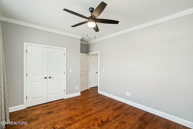 330 Kendall Hunt St, Knoxville, TN 37934 - unfurnished bedroom with ceiling fan, dark hardwood / wood-style floors, ornamental molding, and a closet