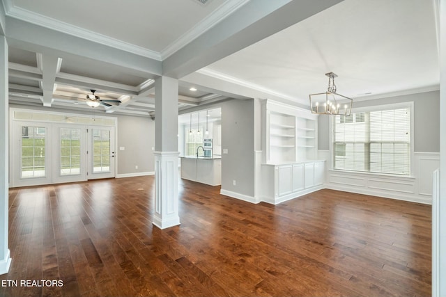 330 Kendall Hunt St, Knoxville, TN 37934 - unfurnished living room featuring decorative columns, ornamental molding, coffered ceiling, ceiling fan with notable chandelier, and beamed ceiling