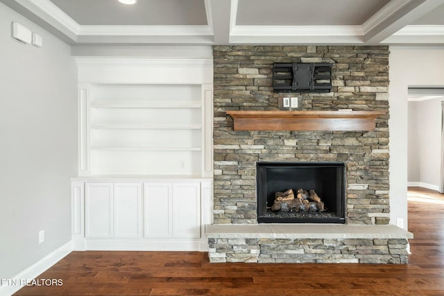 330 Kendall Hunt St, Knoxville, TN 37934 - details featuring beam ceiling, a stone fireplace, built in shelves, and hardwood / wood-style flooring