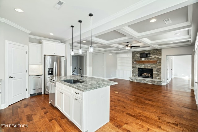 330 Kendall Hunt St, Knoxville, TN 37934 - kitchen with light stone countertops, coffered ceiling, ceiling fan, a center island with sink, and white cabinets