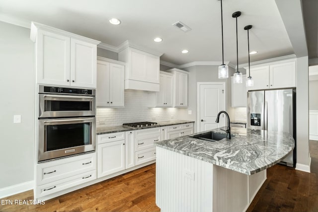 330 Kendall Hunt St, Knoxville, TN 37934 - kitchen featuring a kitchen island with sink, white cabinets, sink, dark hardwood / wood-style floors, and decorative light fixtures