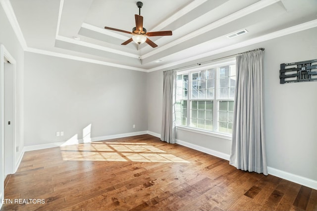 330 Kendall Hunt St, Knoxville, TN 37934 - unfurnished room featuring a tray ceiling, hardwood / wood-style flooring, crown molding, and ceiling fan