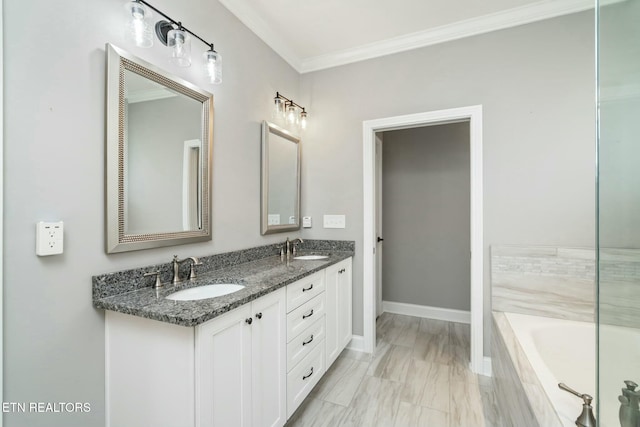330 Kendall Hunt St, Knoxville, TN 37934 - bathroom with vanity, ornamental molding, and tiled bath