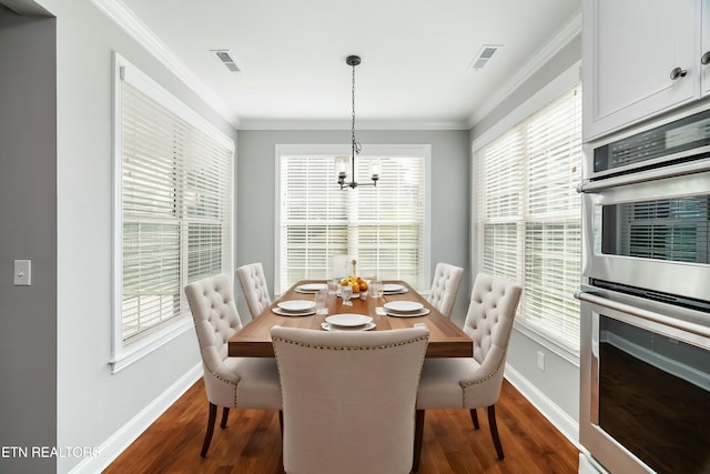 330 Kendall Hunt St, Knoxville, TN 37934 - dining room featuring hardwood / wood-style floors, an inviting chandelier, plenty of natural light, and ornamental molding