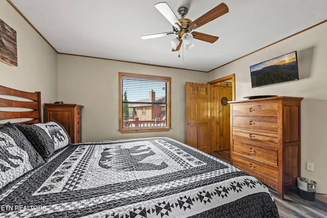 bedroom featuring ceiling fan and hardwood / wood-style floors