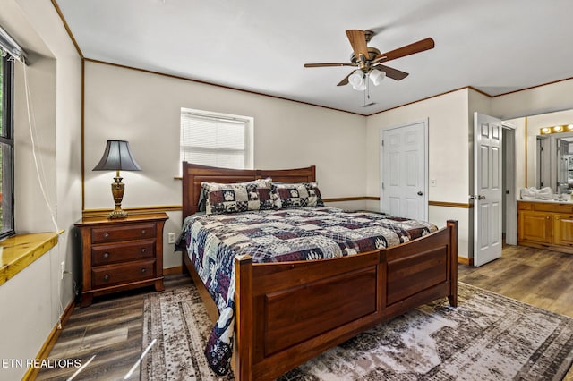 bedroom featuring ensuite bathroom, ceiling fan, crown molding, and dark hardwood / wood-style floors