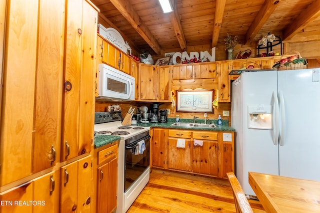 kitchen with white appliances, sink, wooden ceiling, beamed ceiling, and light hardwood / wood-style floors