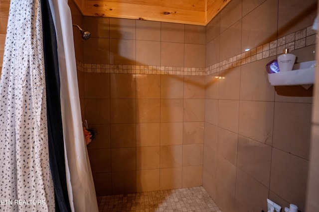 bathroom with a shower with curtain