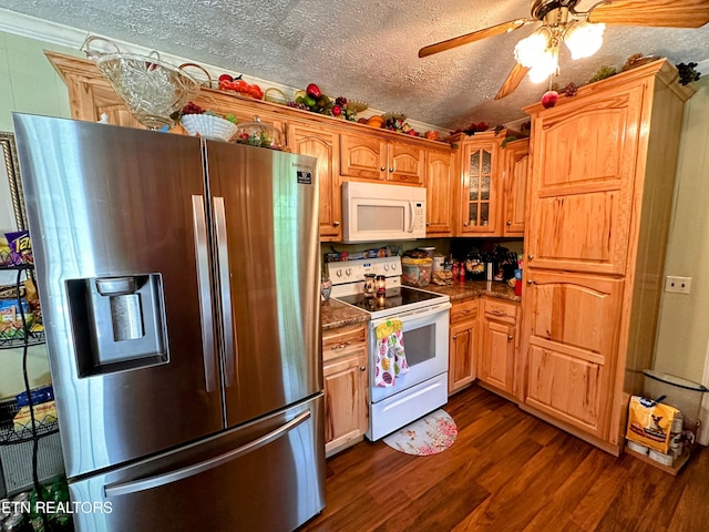 kitchen with a textured ceiling, white appliances, ceiling fan, crown molding, and dark wood-type flooring