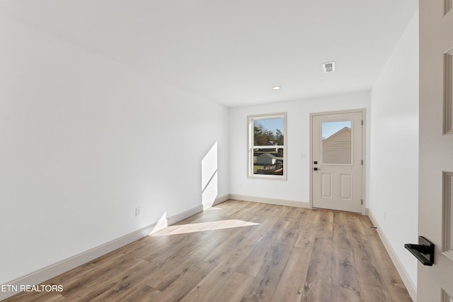 entrance foyer with light hardwood / wood-style flooring