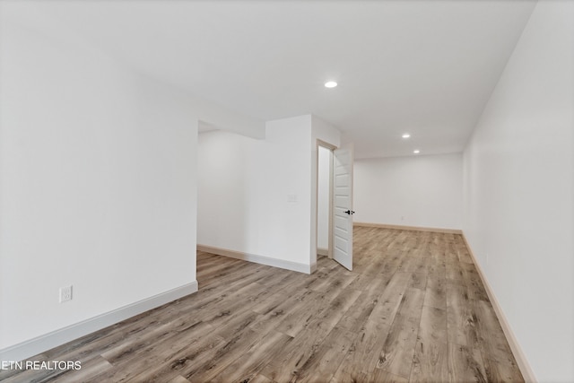 unfurnished room featuring light hardwood / wood-style flooring