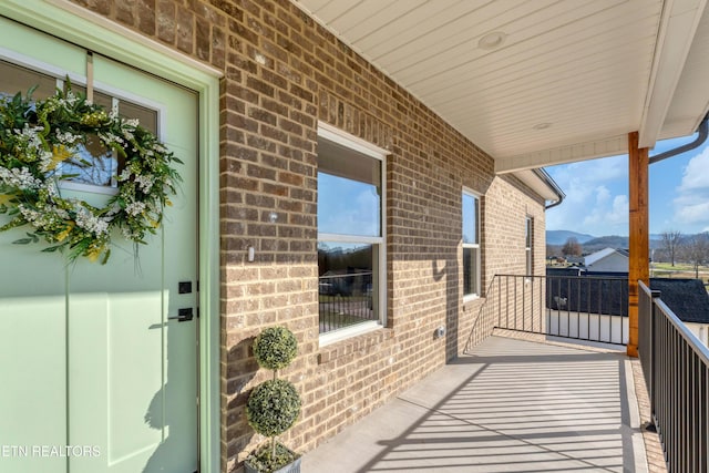 balcony featuring a mountain view