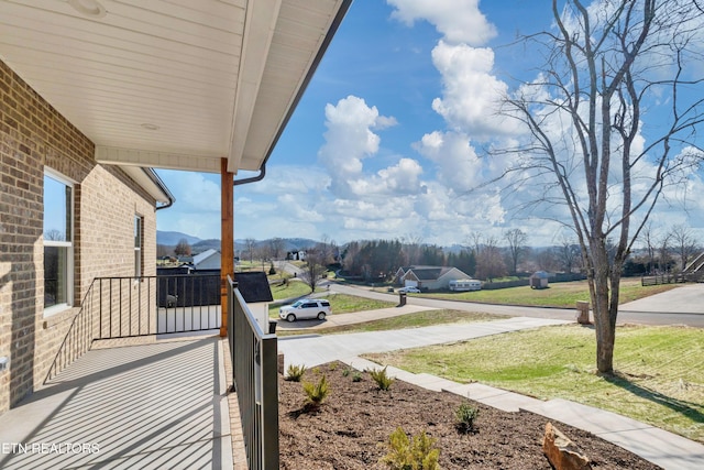 balcony featuring a mountain view