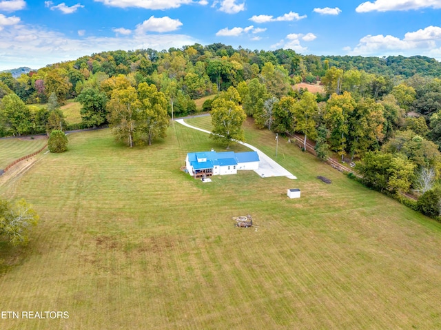 birds eye view of property featuring a rural view