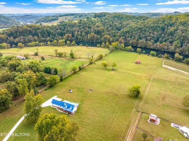 birds eye view of property featuring a rural view