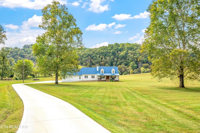 exterior space with a front lawn