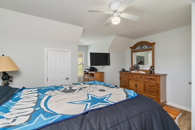 bedroom featuring ceiling fan and hardwood / wood-style floors