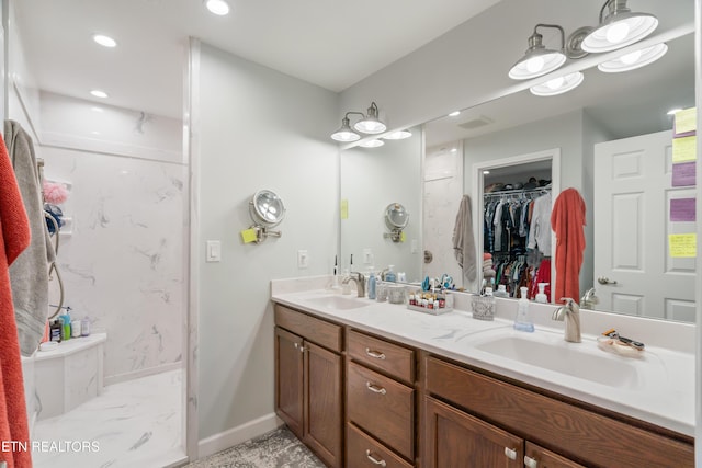 bathroom with vanity and walk in shower