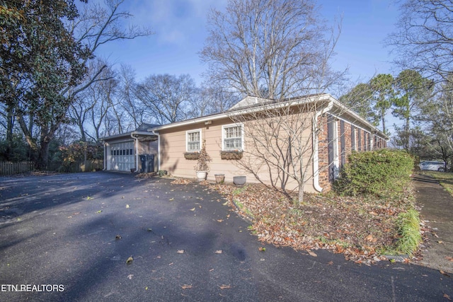 exterior space featuring a garage