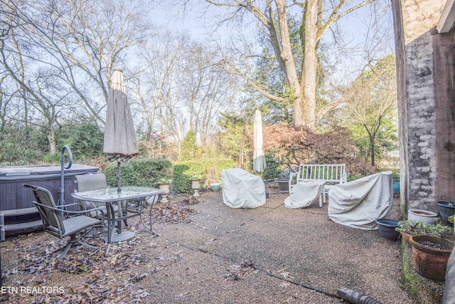 view of patio featuring a hot tub