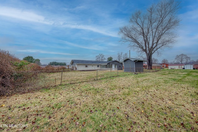 view of yard with a rural view