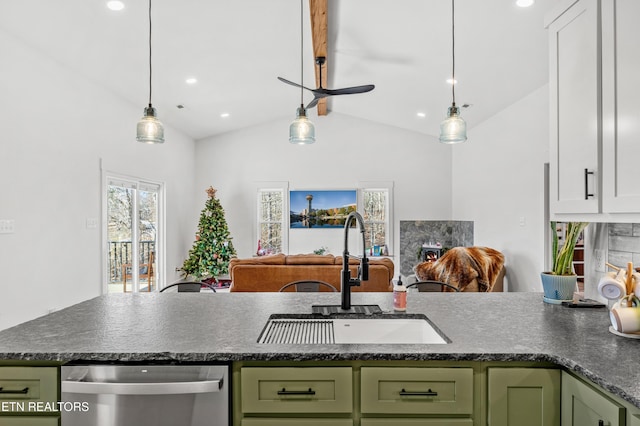 kitchen with sink, lofted ceiling, white cabinetry, hanging light fixtures, and green cabinets